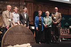 Joseph Madsen, Eli Hall, Ander Crenshaw, Gigi Graham, Jean Ford, and Paul Maurer posing with Graham Chapel plaque