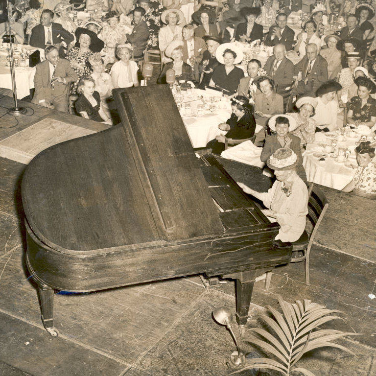 Photograph of Mrs. Crosby Adams Playing Piano at Chicagoland Music Festival in 1948