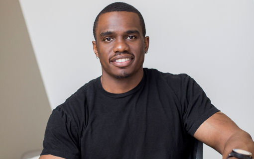Thumbnail image of Rwenshaun Miller, smiling and looking at the camera