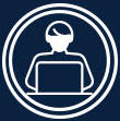 Icon of a person sitting at a computer
