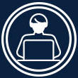 Icon of a person sitting at a computer