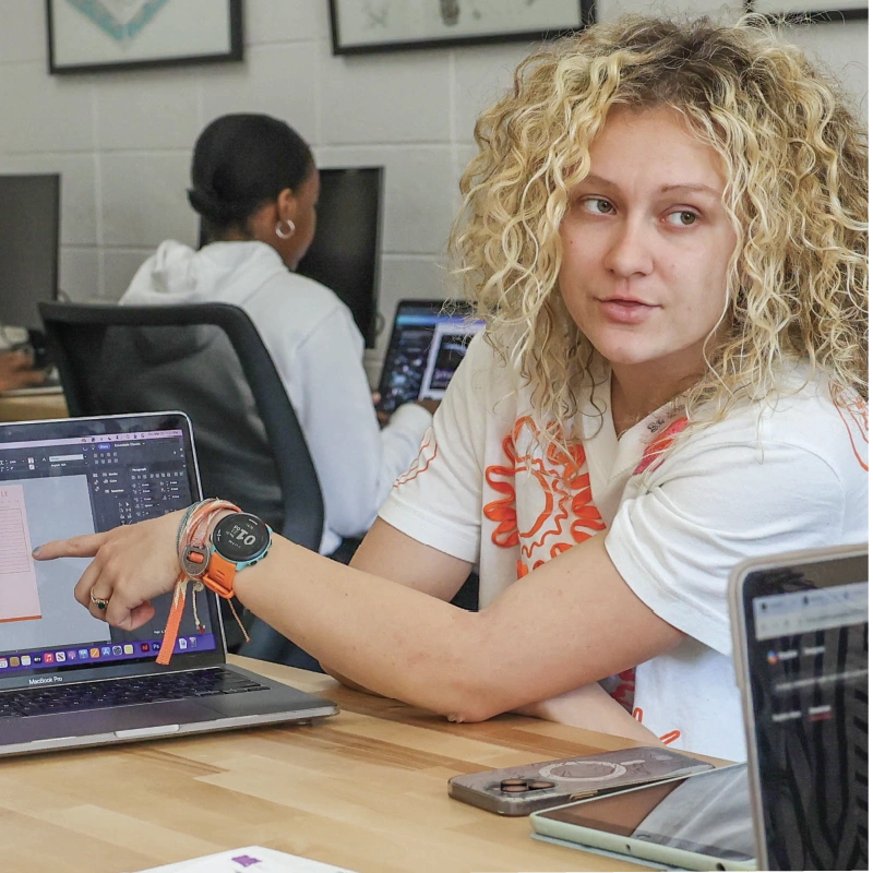 Female student on computer in classroom