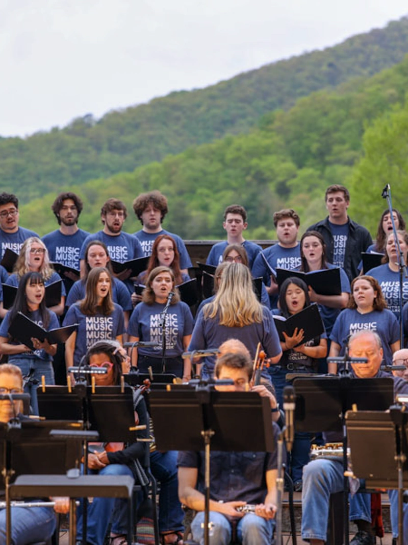 The Montreat College orchestra and choir performs outside