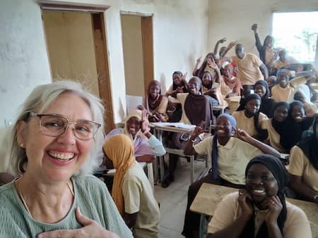 Dorothy Holley with a full classroom in Senegal