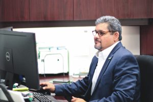 Tim Bugg working at a computer