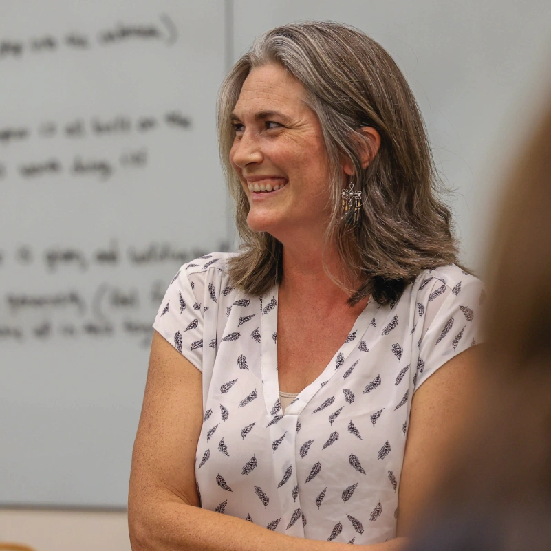 An older woman smiles