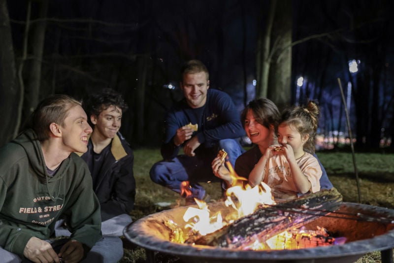Young people around a bonfire