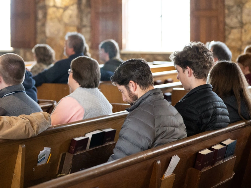 Young people sitting in Graham Chapel