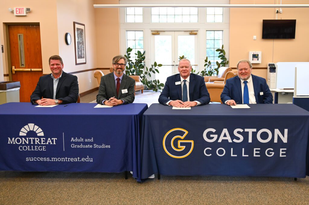 Rob Roth, Paul Gratton, and two Gaston College representatives